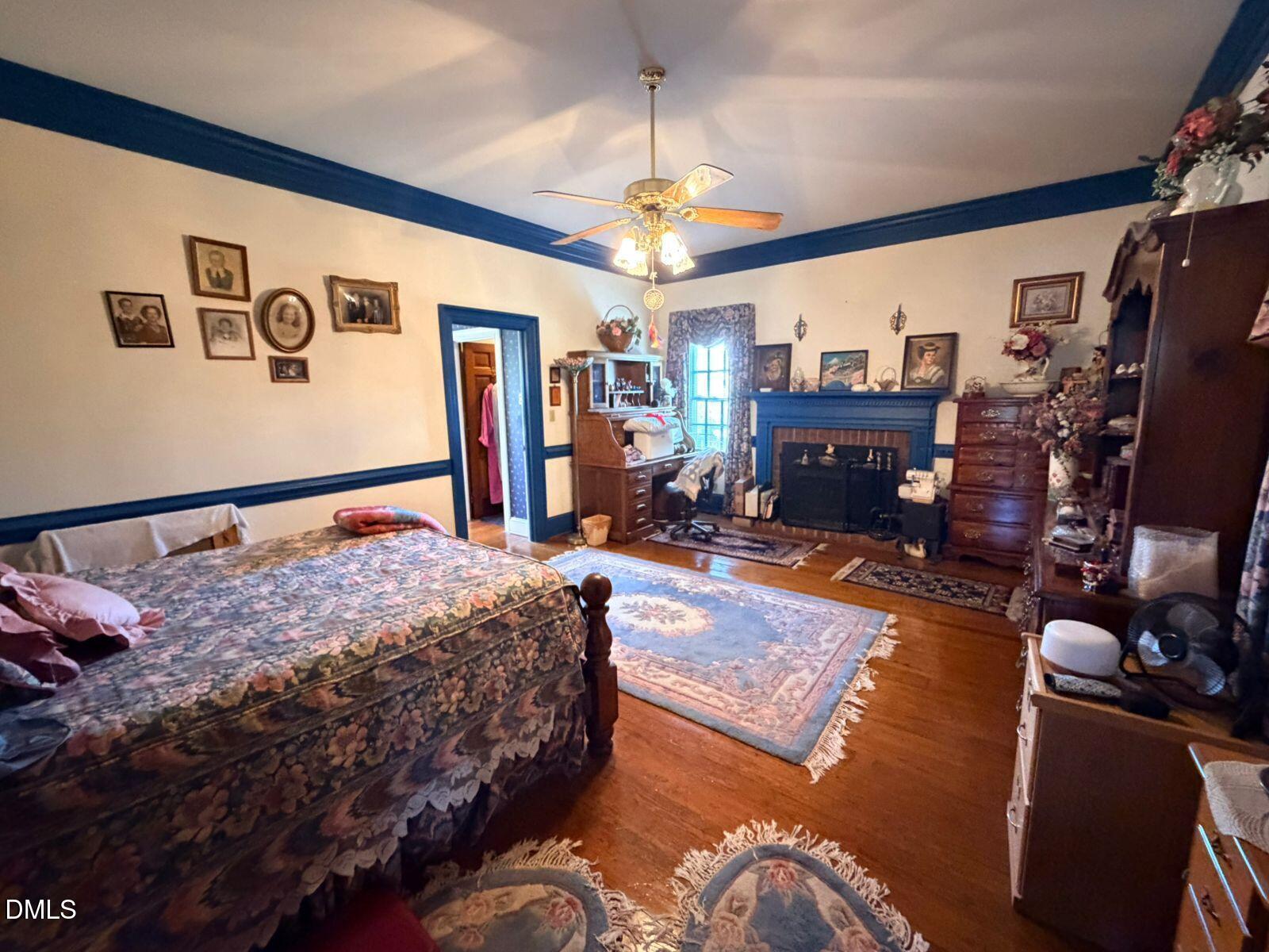 9222 Midway Road Bailey, NC 27807 - Photo 15 of 35 a bed room with a bed