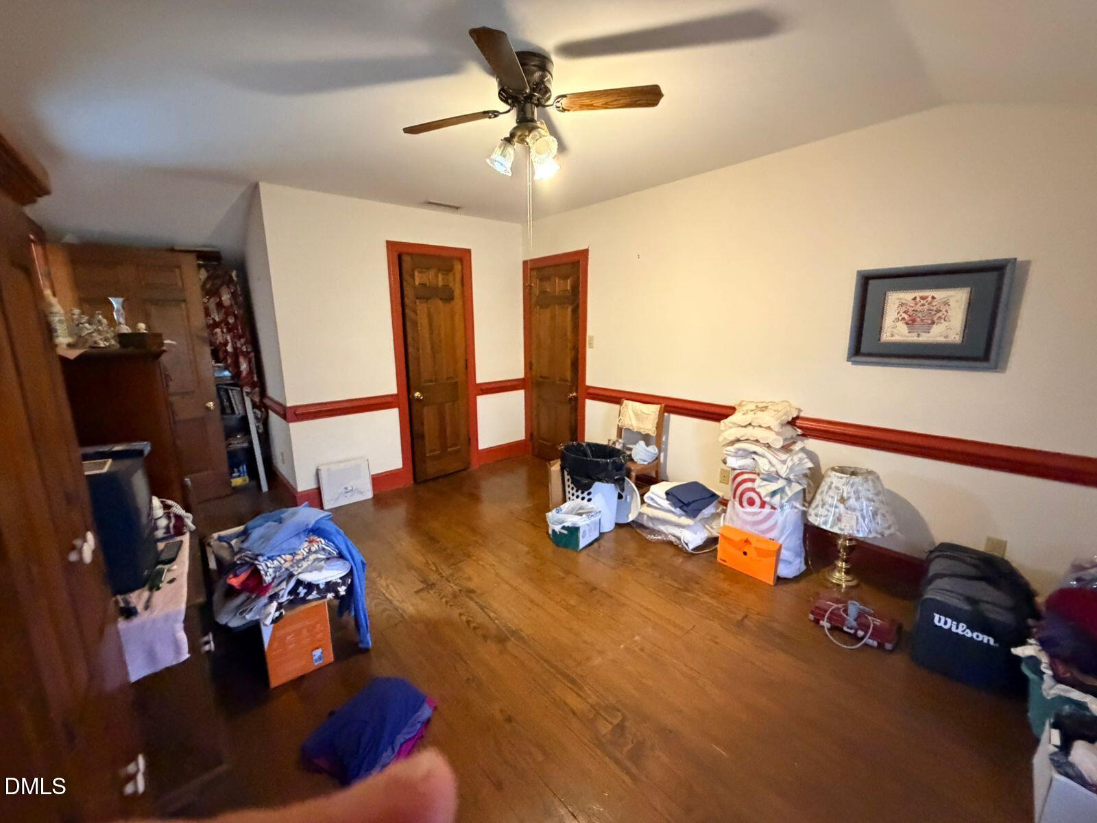 9222 Midway Road Bailey, NC 27807 - Photo 20 of 35 a living room with furniture and a flat screen tv