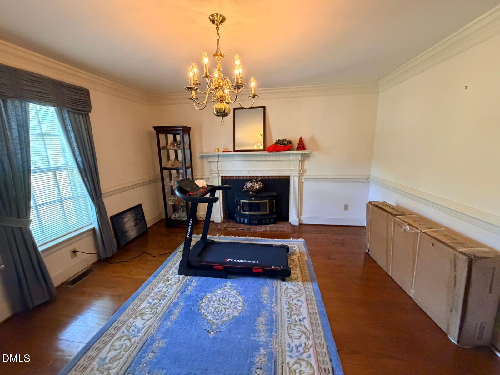 9222 Midway Road Bailey, NC 27807 - Photo 7 of 35 a living room with furniture and a fireplace