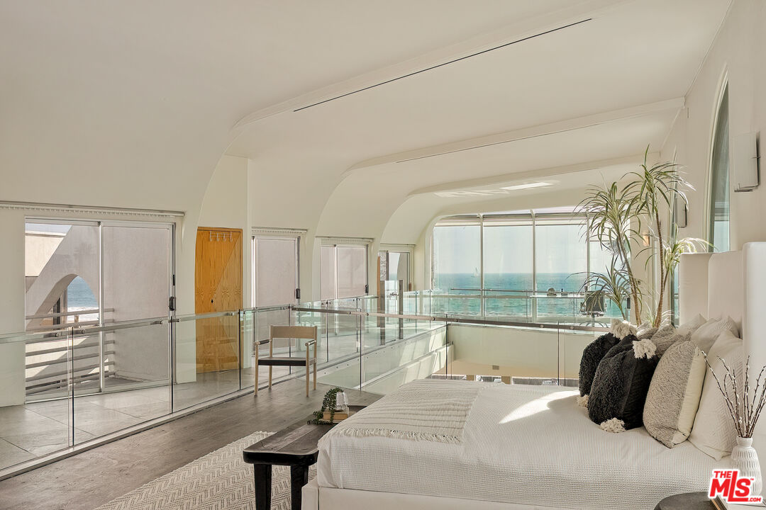 3111 Ocean Front Walk Marina del Rey, CA 90292 - Photo 8 of 17 a bedroom with a bed and a view of kitchen