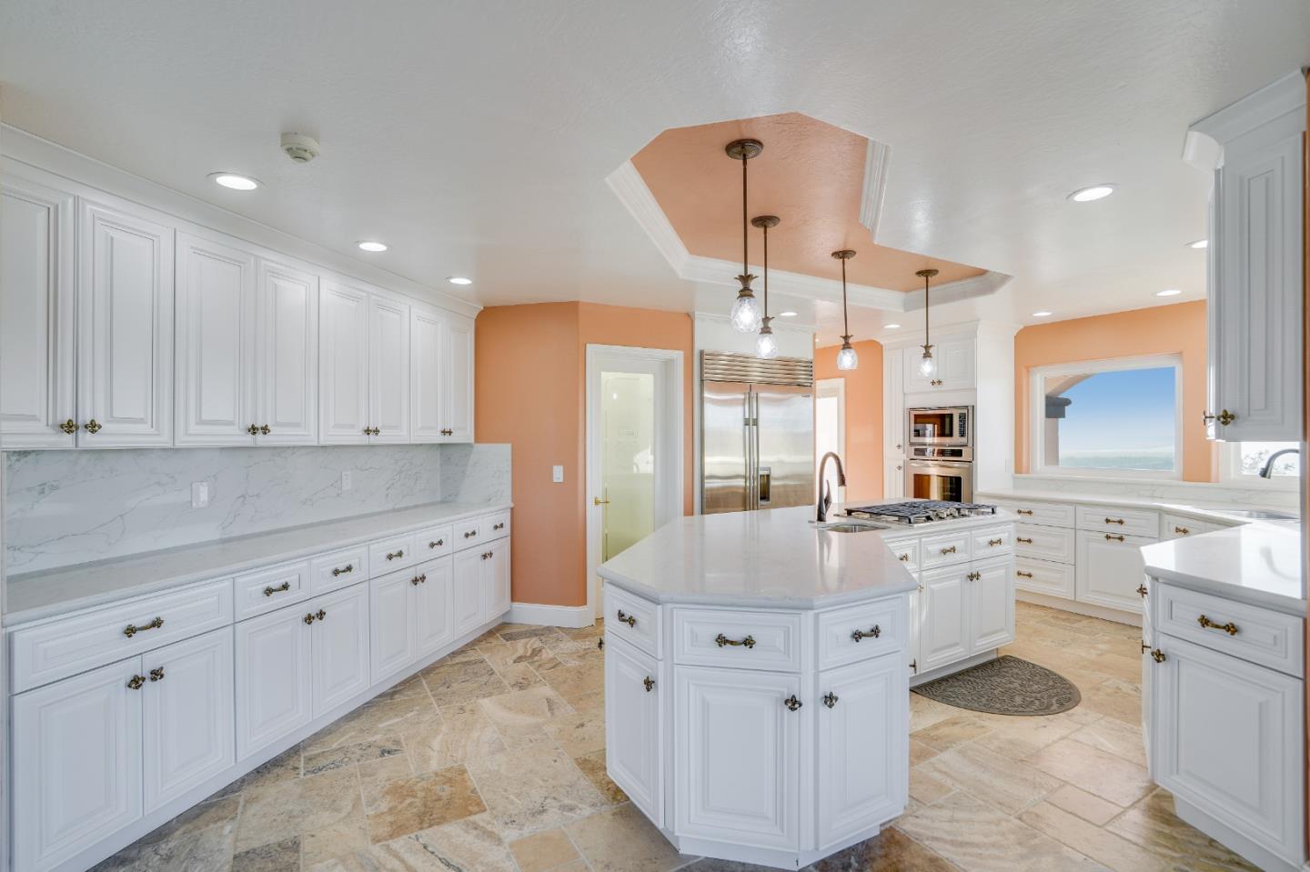 20460 Viewpoint Road Castro Valley, CA 94552 - Photo 18 of 50 a large white kitchen with a large window