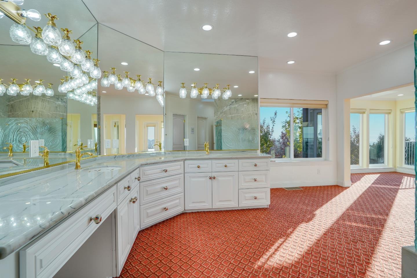 20460 Viewpoint Road Castro Valley, CA 94552 - Photo 25 of 50 a spacious bathroom with a granite countertop sink a large mirror and a shower