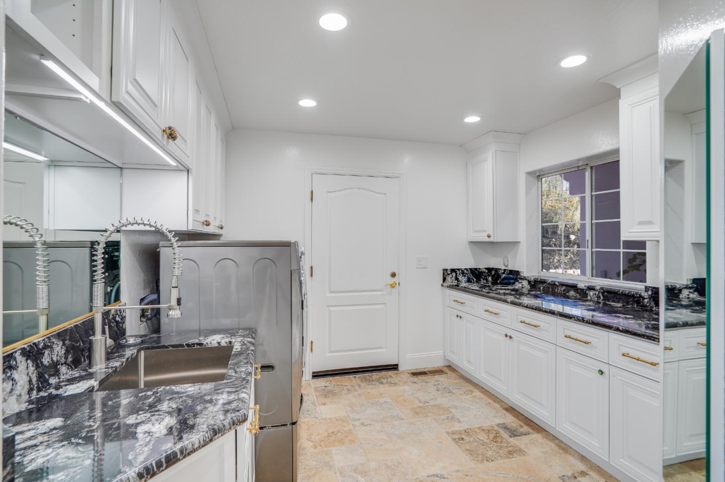 20460 Viewpoint Road Castro Valley, CA 94552 - Photo 34 of 50 a kitchen with stainless steel appliances granite countertop a sink stove and refrigerator