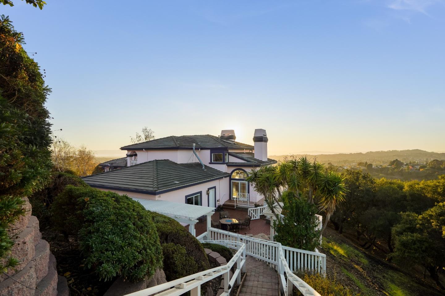 20460 Viewpoint Road Castro Valley, CA 94552 - Photo 39 of 50 a view of a house with a yard and roof