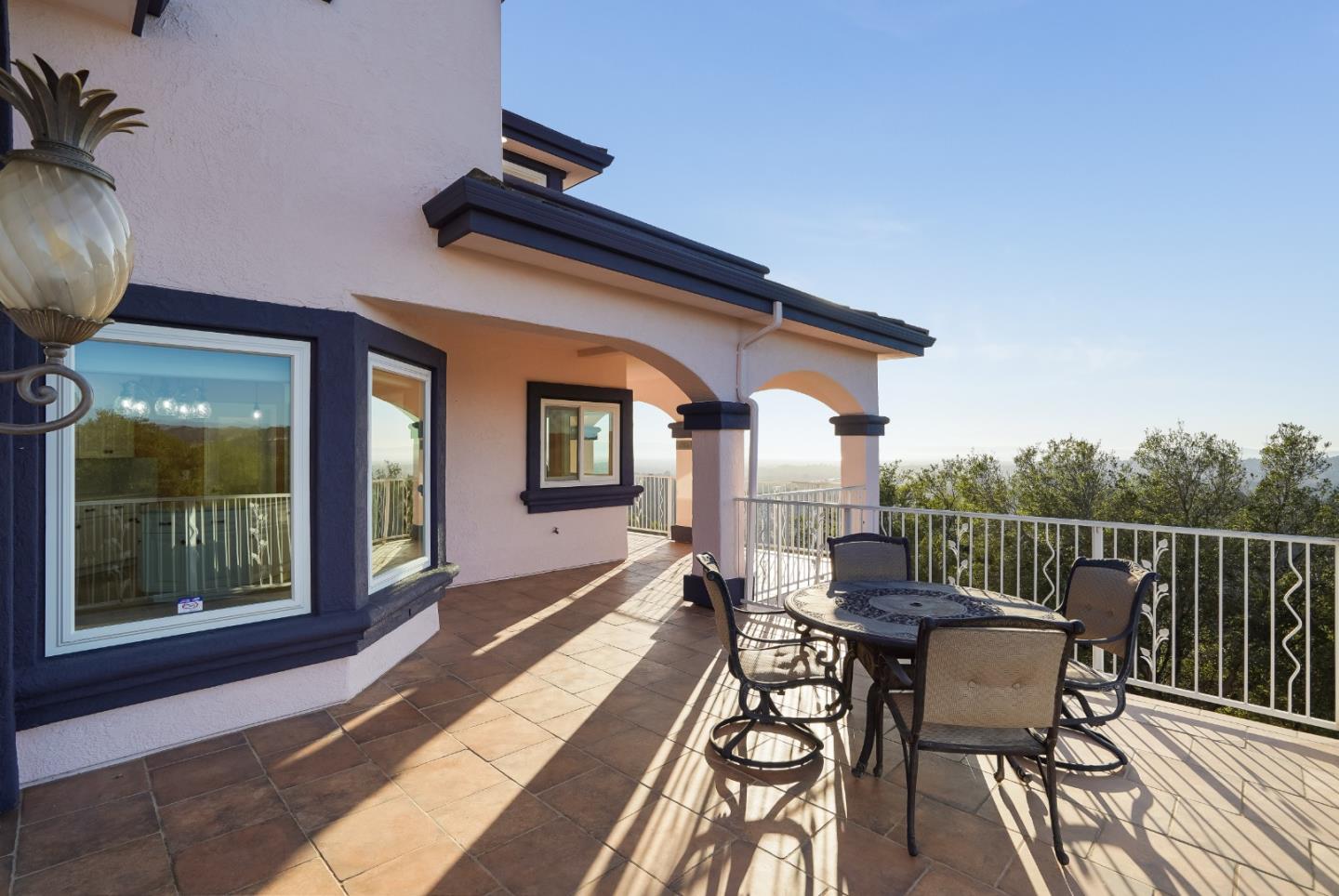 20460 Viewpoint Road Castro Valley, CA 94552 - Photo 42 of 50 a roof deck with table and chairs and potted plants