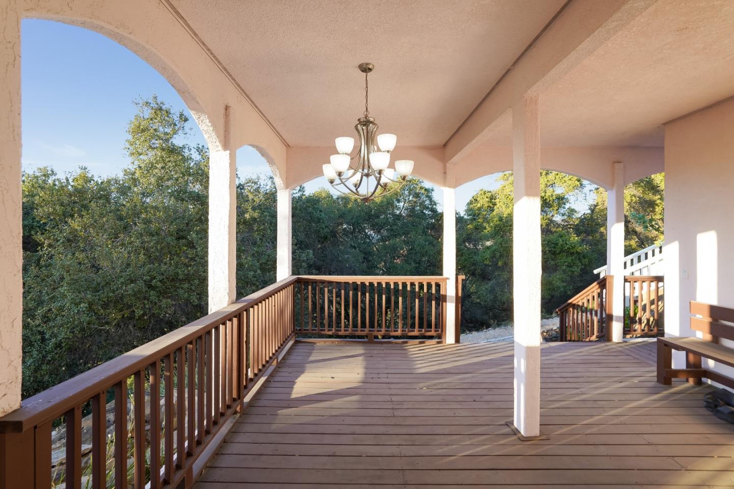 20460 Viewpoint Road Castro Valley, CA 94552 - Photo 46 of 50 a view of a porch with wooden floor and outdoor seating
