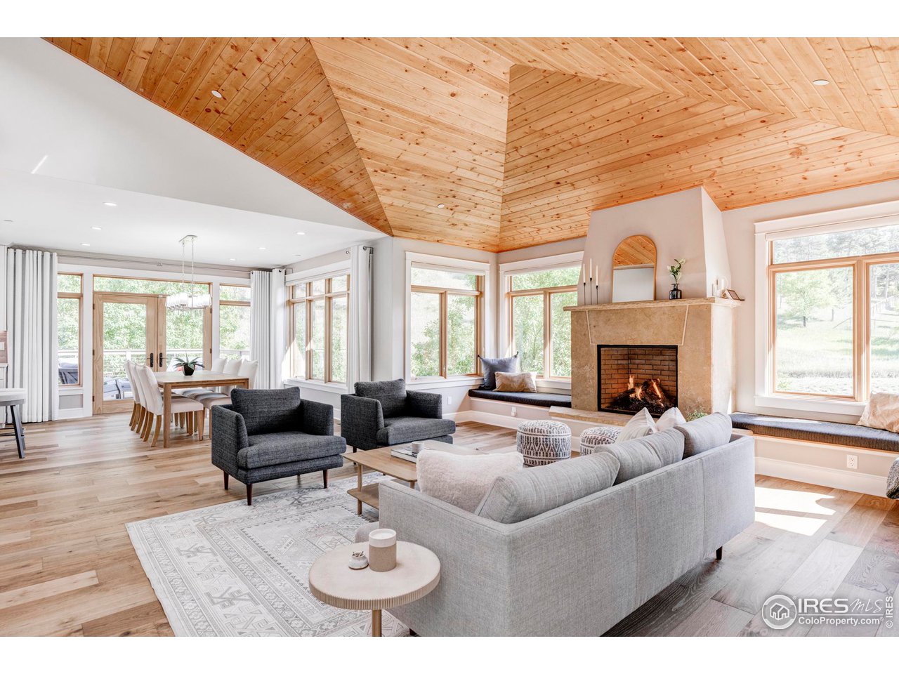 7010 Olde Stage Road Boulder, CO 80302 - Photo 5 of 35 stunning great room with vaulted ceilings, gas fireplace and white oak flooring