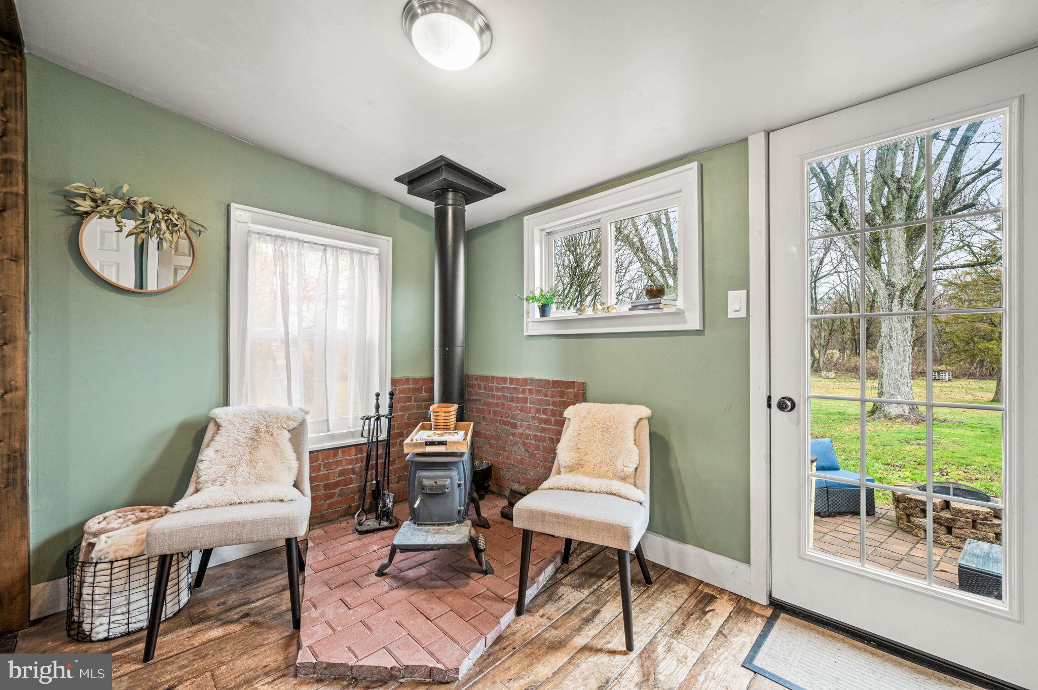 3319 Salford Station Road Perkiomenville, PA 18074 - Photo 13 of 27 Sitting area/Woodstove
