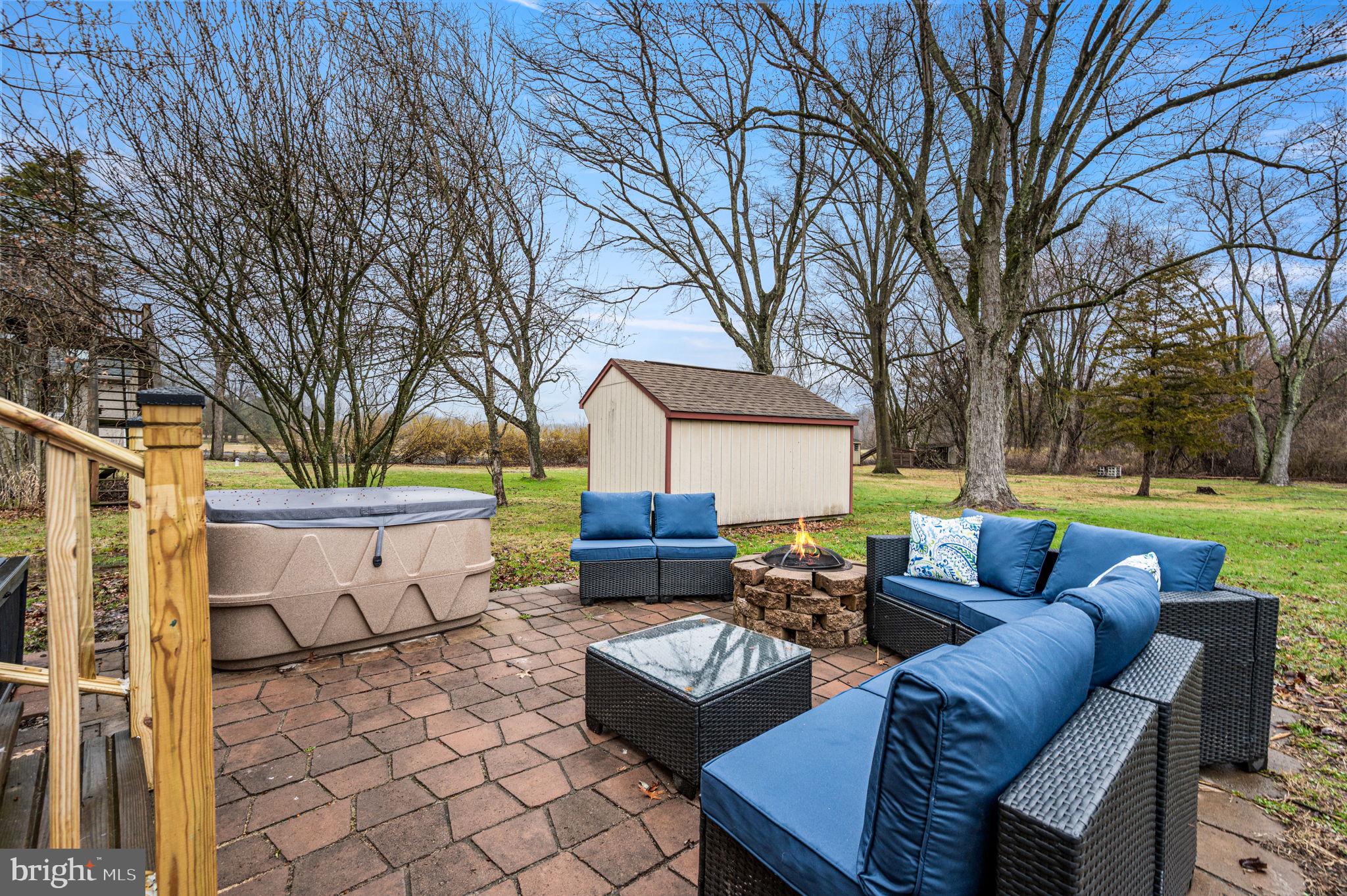 3319 Salford Station Road Perkiomenville, PA 18074 - Photo 18 of 27 Outdoor Patio with hot tub and firepit
