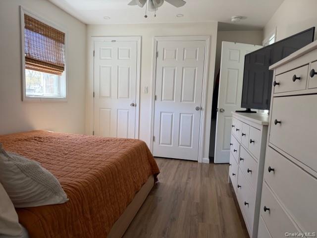 10 Hollingsworth Place Centereach, NY 11720 - Photo 11 of 19 a bedroom with a bed and a window