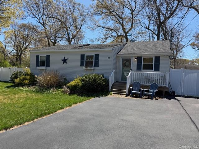 10 Hollingsworth Place Centereach, NY 11720 - Photo 2 of 19 a view of a house with backyard and a tree