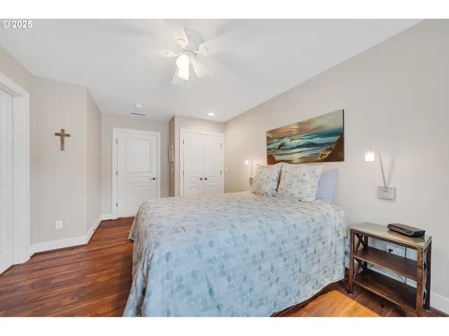 a bedroom with furniture and a window