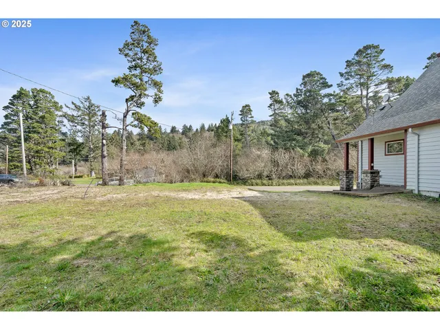a view of a chairs and table in the balcony
