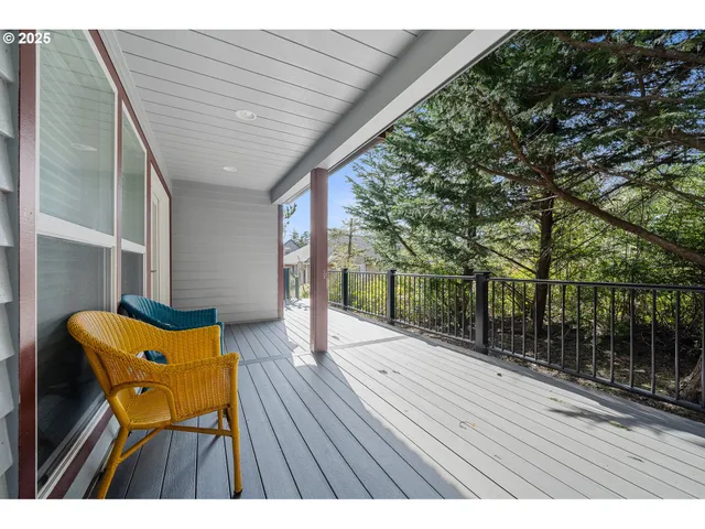 a living room with furniture fireplace and flat screen tv