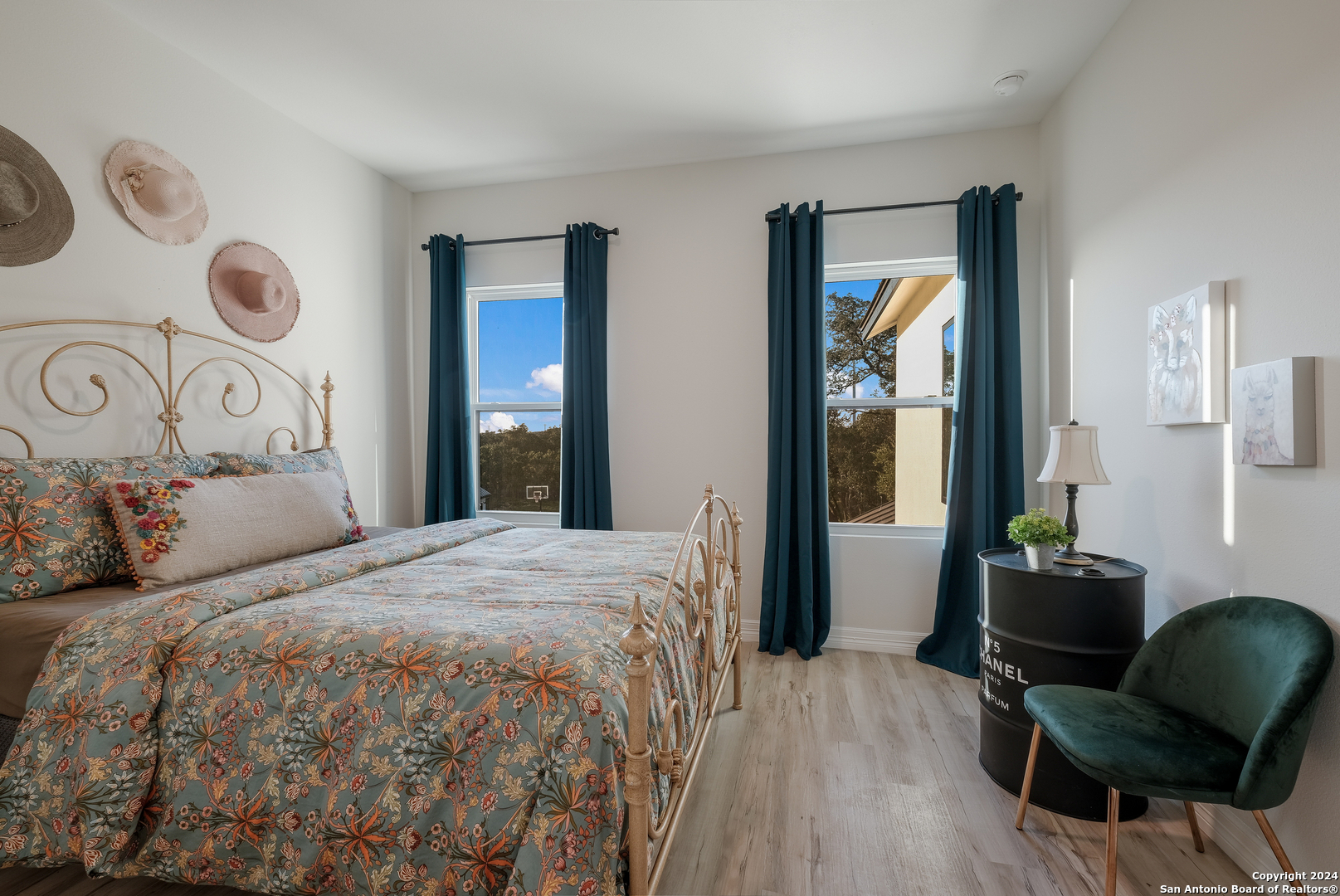 718 Post Oak Ridge Way Bulverde, TX 78163 - Photo 26 of 60 a bedroom with a bed and furniture