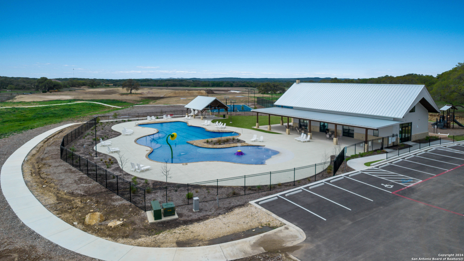 718 Post Oak Ridge Way Bulverde, TX 78163 - Photo 55 of 60 an aerial view of a house with swimming pool patio and outdoor seating