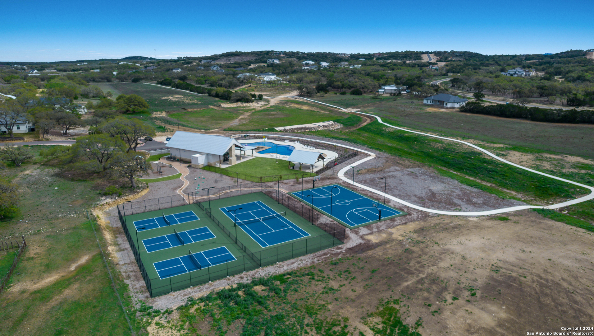 718 Post Oak Ridge Way Bulverde, TX 78163 - Photo 59 of 60 an aerial view of a house