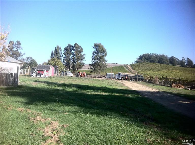 View of neighboring vineyards from near back of home. Lot goes further back and to the left.