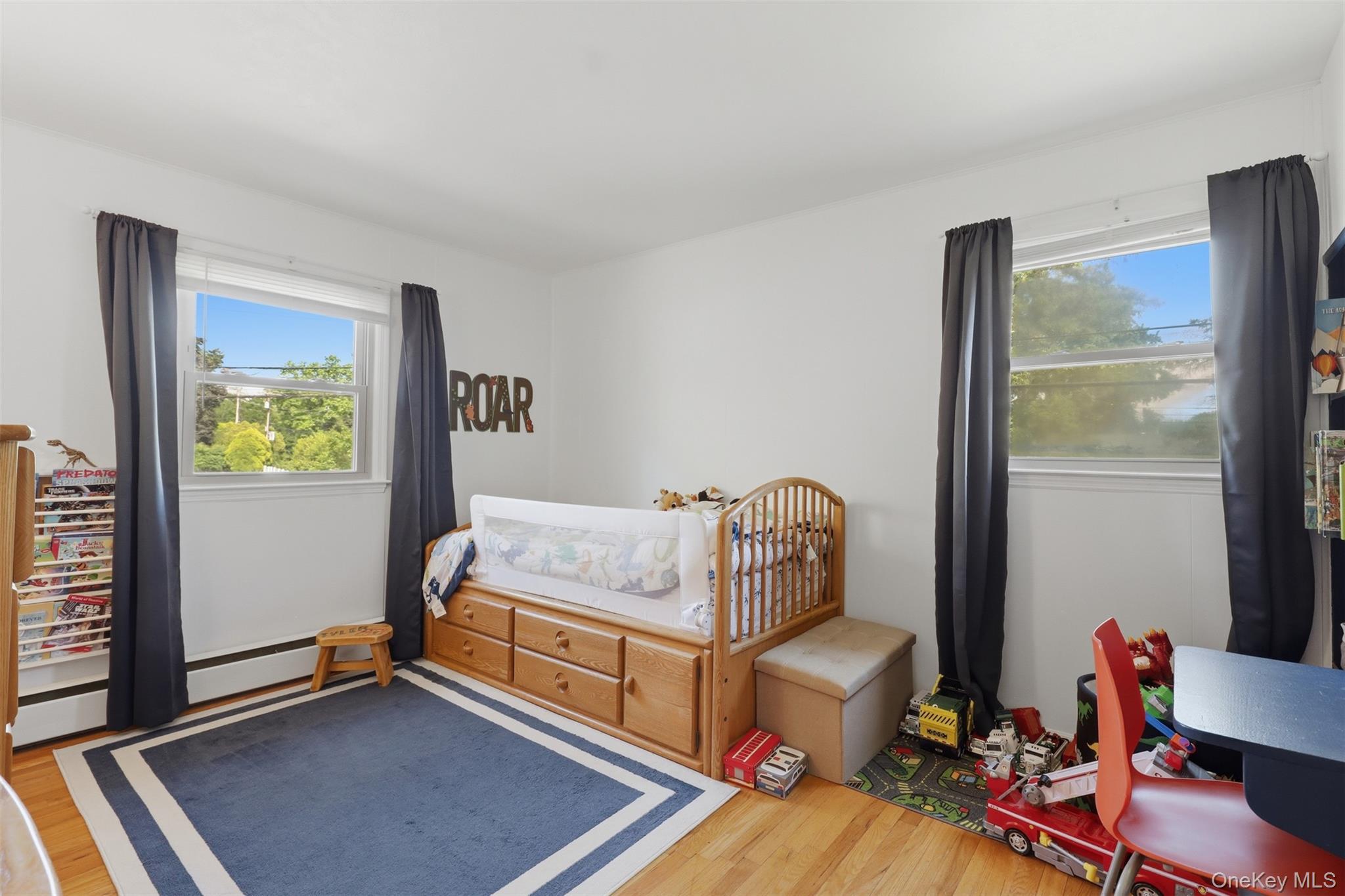 24 Beatty Road Wappingers Falls, NY 12590 - Photo 20 of 36 a bedroom with furniture and a window