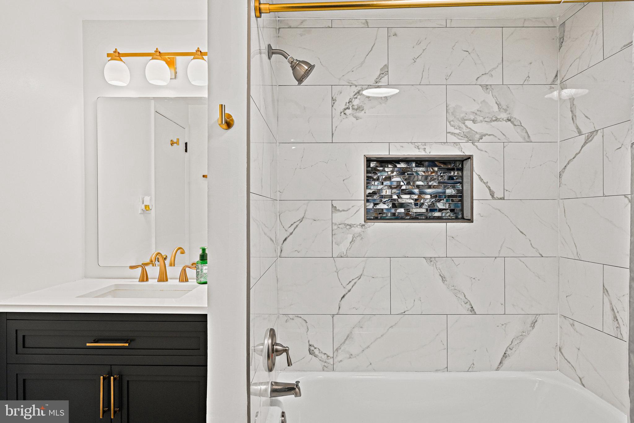 7925 Orange Plank Road Springfield, VA 22153 - Photo 22 of 43 Recently renovated main bath with new tub and tile