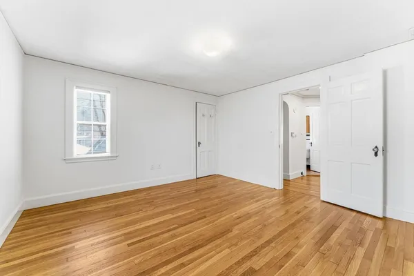 a view of empty room with windows