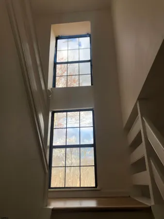 a kitchen with a sink appliances and cabinets