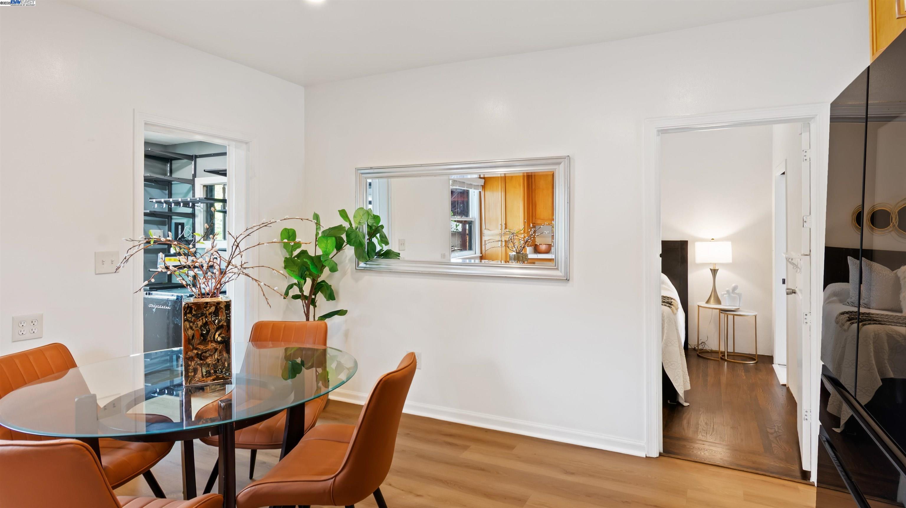 830 Buena Vista Avenue Alameda, CA 94501 - Photo 15 of 28 a view of a dining room with furniture and wooden floor