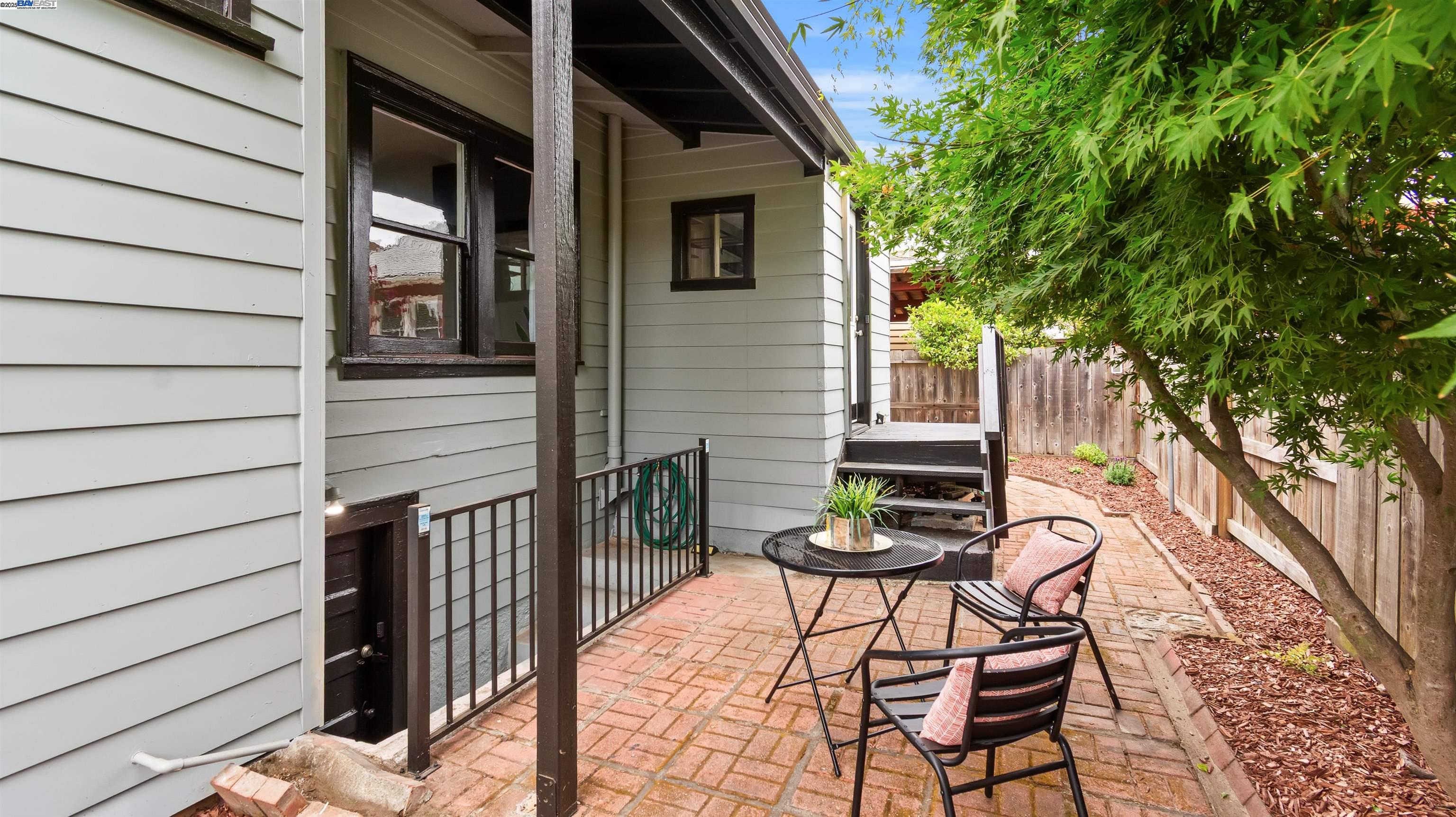 830 Buena Vista Avenue Alameda, CA 94501 - Photo 24 of 28 a view of a chair and table in backyard of the house