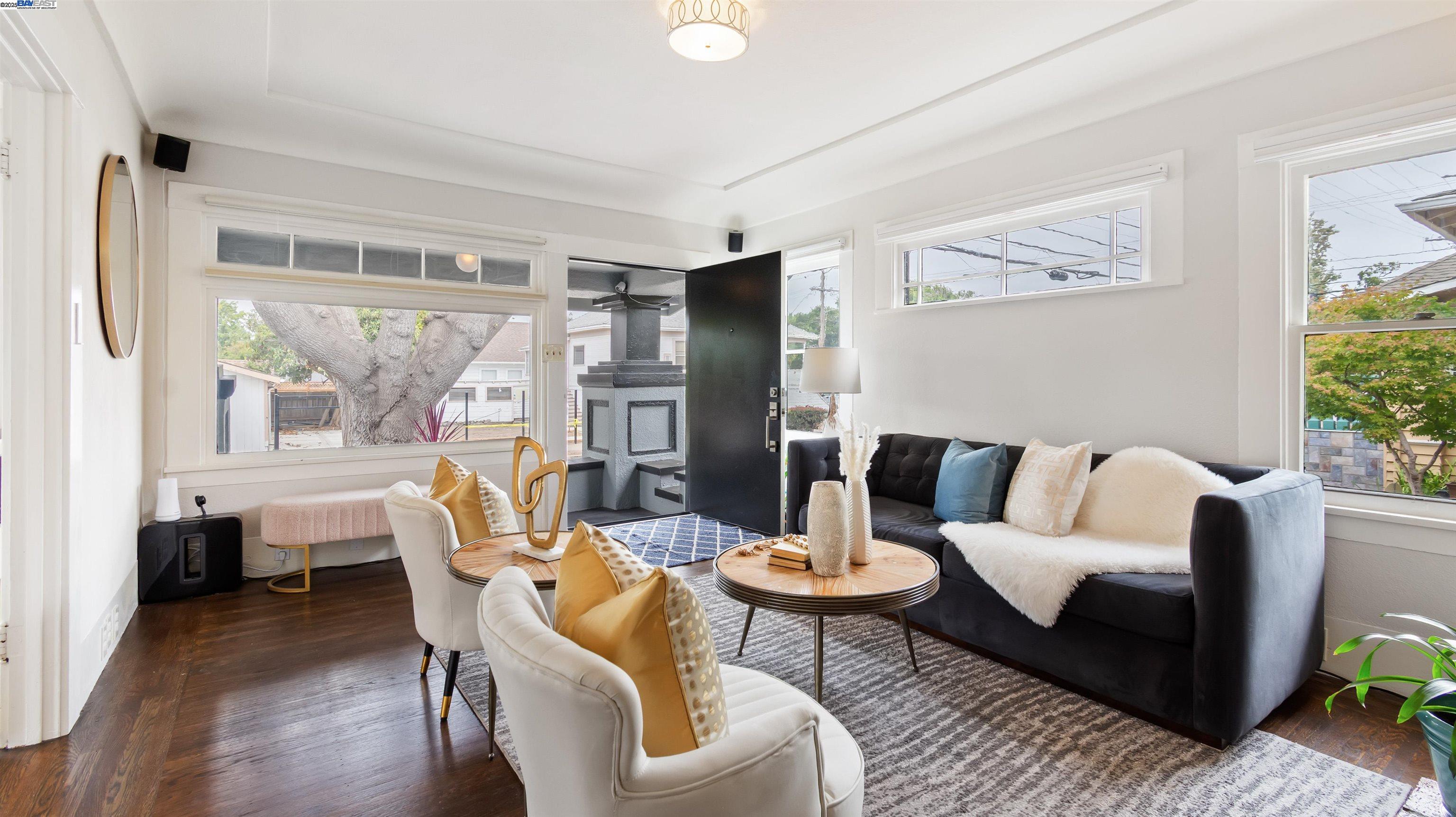 830 Buena Vista Avenue Alameda, CA 94501 - Photo 9 of 28 a living room with furniture and a table