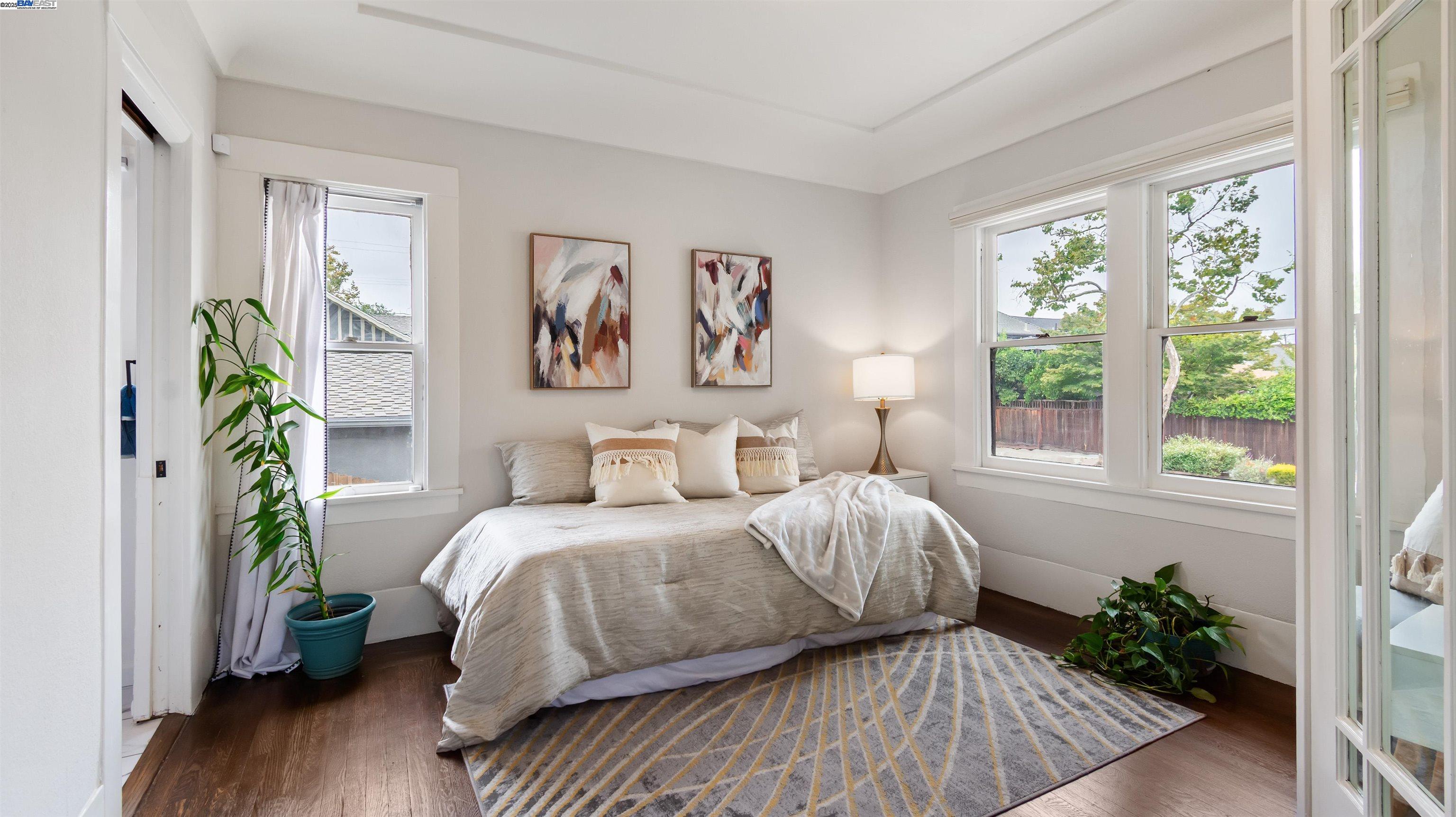 830 Buena Vista Avenue Alameda, CA 94501 - Photo 10 of 28 a bed sitting in a bedroom next to a window