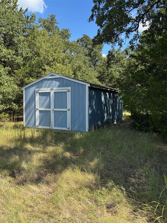 10236 County Road 2326, Unit TRACT 1 Terrell, TX 75160 - Photo 19 of 19 a backyard of a house with lots of green space
