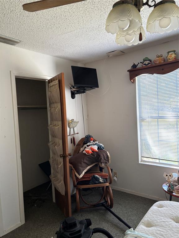 10236 County Road 2326, Unit TRACT 1 Terrell, TX 75160 - Photo 10 of 19 a bedroom with a bunk bed and a wooden floor