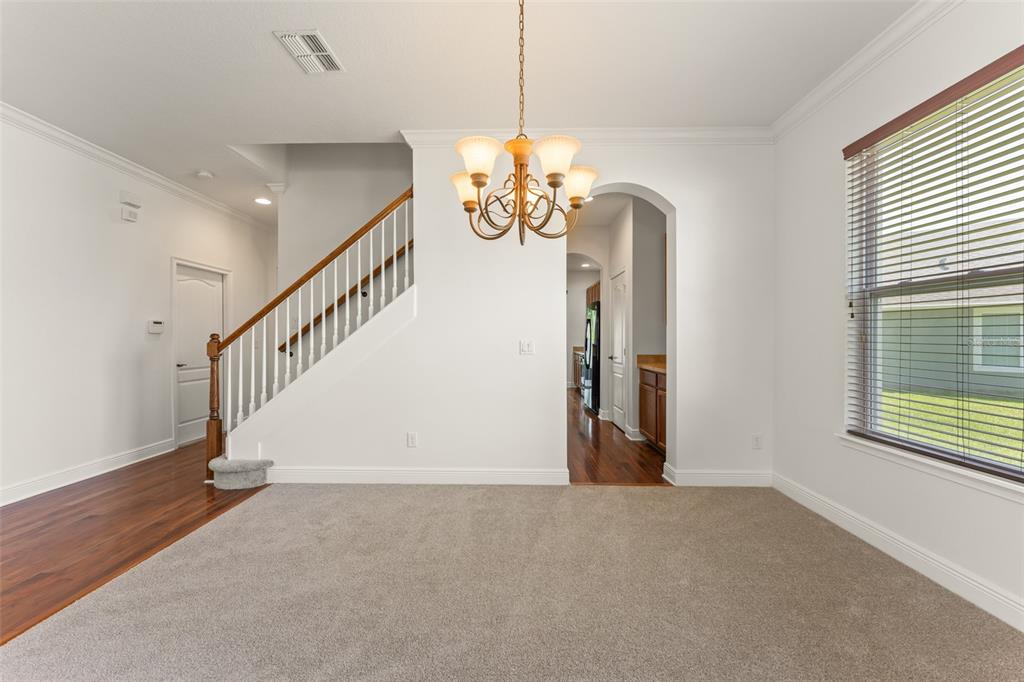 13544 Riggs Way Windermere, FL 34786 - Photo 11 of 58 a view of entryway and hall with a chandelier