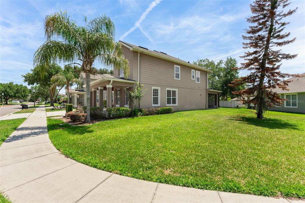 13544 Riggs Way Windermere, FL 34786 - Photo 2 of 58 a view of a house with backyard and a tree