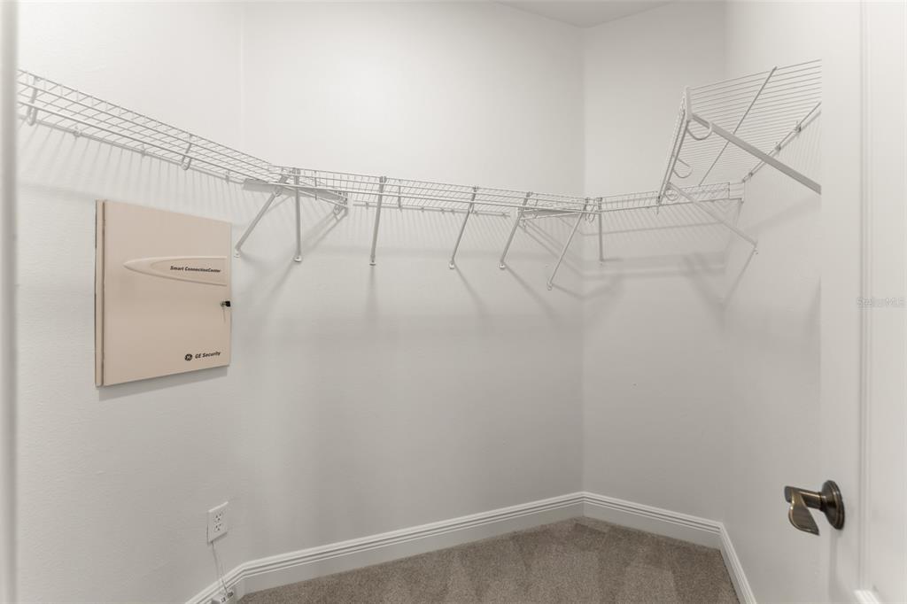 13544 Riggs Way Windermere, FL 34786 - Photo 34 of 58 a view of small space with racks on the wall