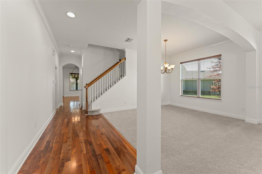 13544 Riggs Way Windermere, FL 34786 - Photo 4 of 58 a view of entryway and hall with wooden floor