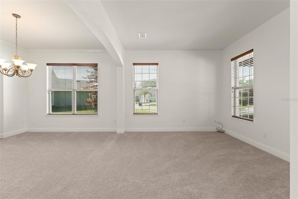 13544 Riggs Way Windermere, FL 34786 - Photo 5 of 58 a view of an empty room with a window