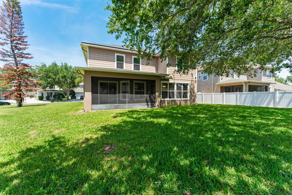 13544 Riggs Way Windermere, FL 34786 - Photo 57 of 58 a house view with a garden space