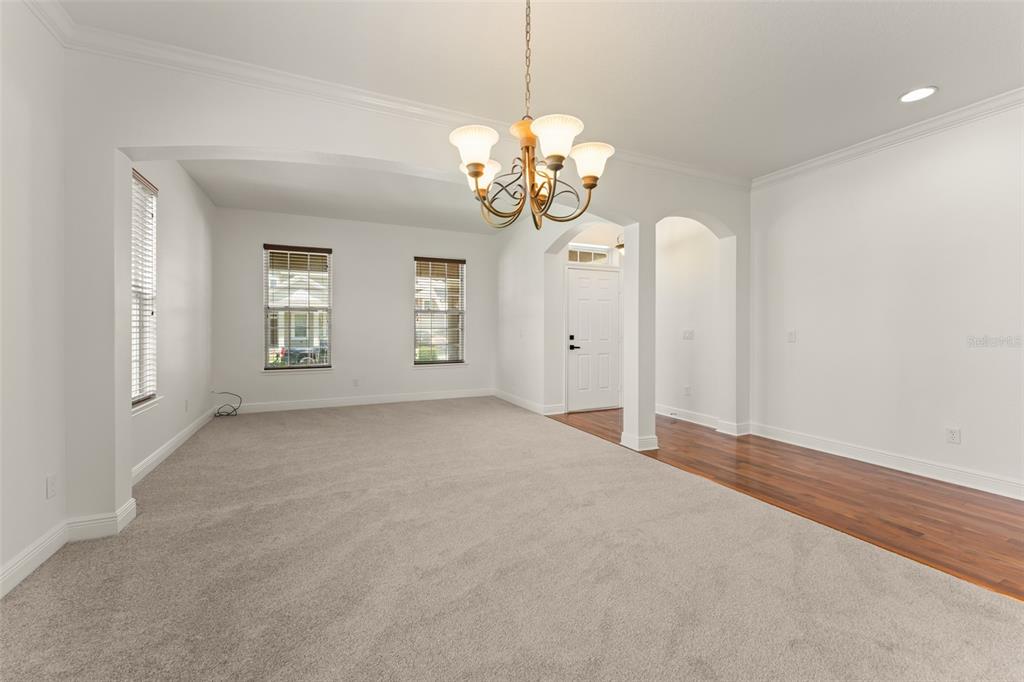 13544 Riggs Way Windermere, FL 34786 - Photo 8 of 58 a view of a chandelier in big room and chandelier