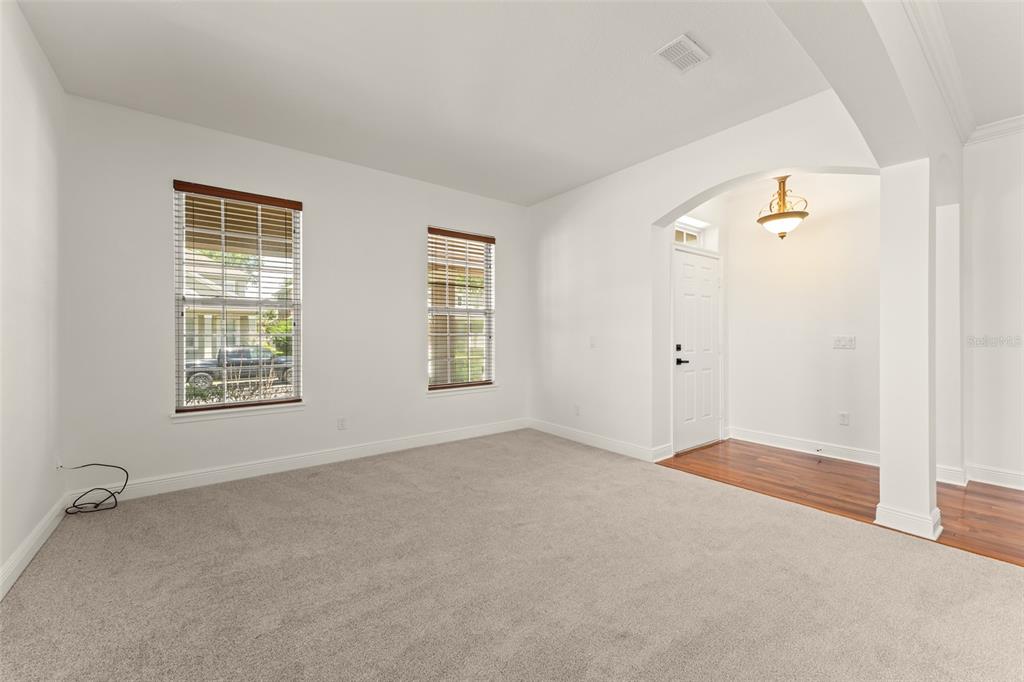 13544 Riggs Way Windermere, FL 34786 - Photo 9 of 58 a view of an empty room with a window