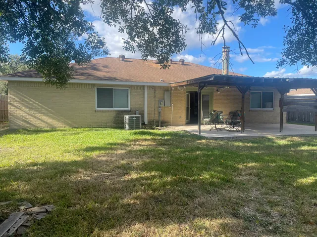 a front view of a house with patio
