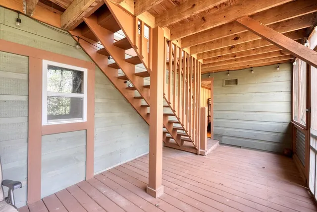 a view of entryway with wooden floor