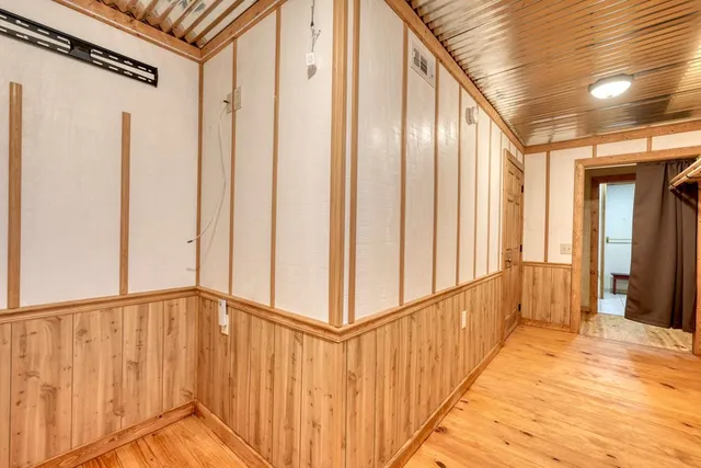 a view of a forest from a balcony