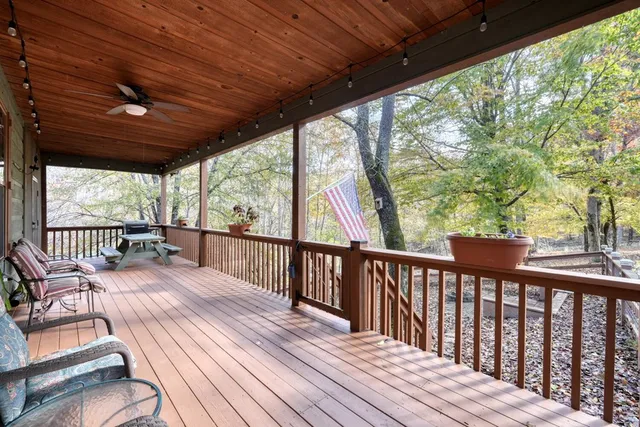 a view of a patio with wooden floor
