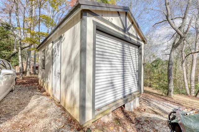 a view of a park with large trees