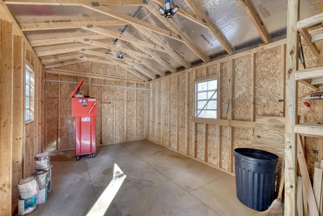 a view of a park with large trees