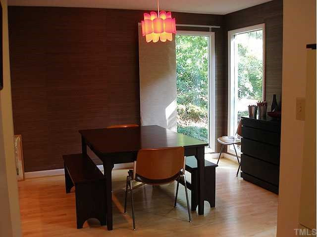 2905 Debra Drive Raleigh, NC 27607 - Photo 5 of 12 Enjoy intimate dinners or entertaining guests in this lovely dining room with chocolate brown, grass wallpaper. Dining Room