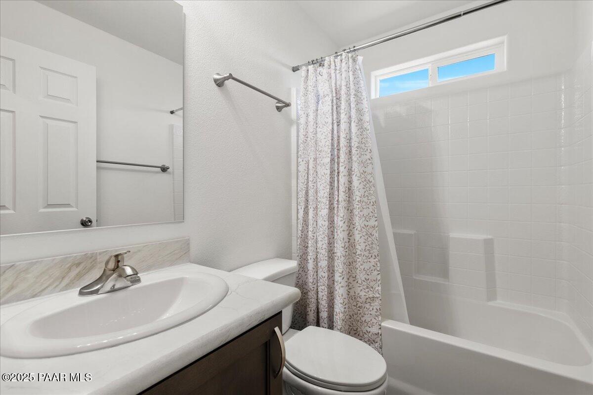 1529 Private Road Prescott, AZ 86301 - Photo 14 of 25 a bathroom with a sink toilet and shower