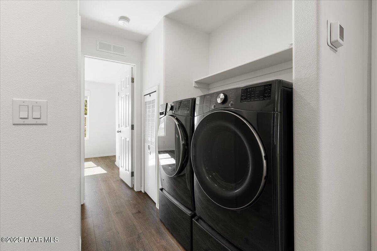1529 Private Road Prescott, AZ 86301 - Photo 17 of 25 a view of a hallway with washer and dryer