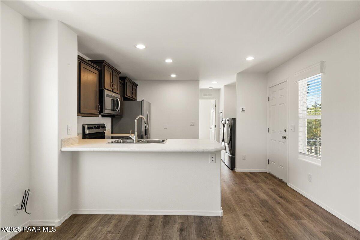 1529 Private Road Prescott, AZ 86301 - Photo 6 of 25 a view of kitchen with stainless steel appliances granite countertop a refrigerator and a sink
